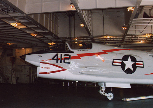 F8_002.jpg - F-8 Crusader, built by Vought, was a single seat carrier based air superiority fighter aircraft. Replaced the F-7 Cutlass and first flew with a fleet squadron in 1958 until last squadron retired from the USS Oriskany in 1976. However, the French flew them into the early 1990s and retired in 1999. Was known as the "last gunfighter" since the 20mm cannons were the primary weapon when developed although the plane carried AIM-9 Sidewinder missles in Vietnam. Of 19 MIGs downed only four where by cannon and the others Sidewinders.